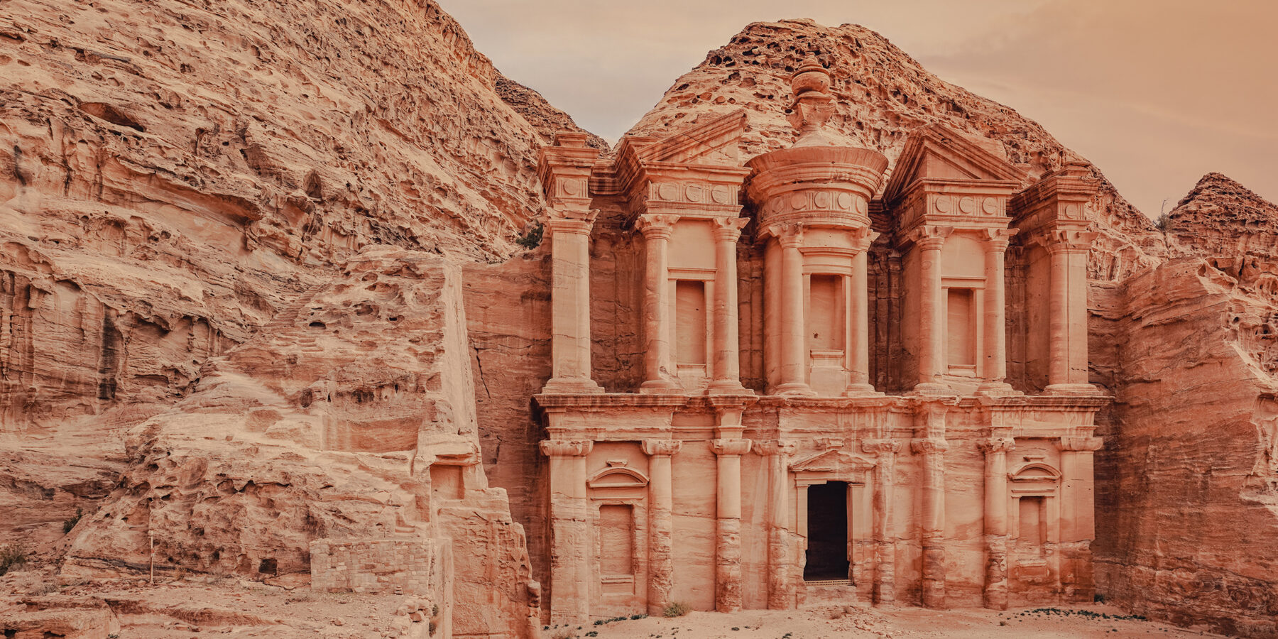 Ad Deir – Monastery – ruins carved in rocky wall at Petra Jordan