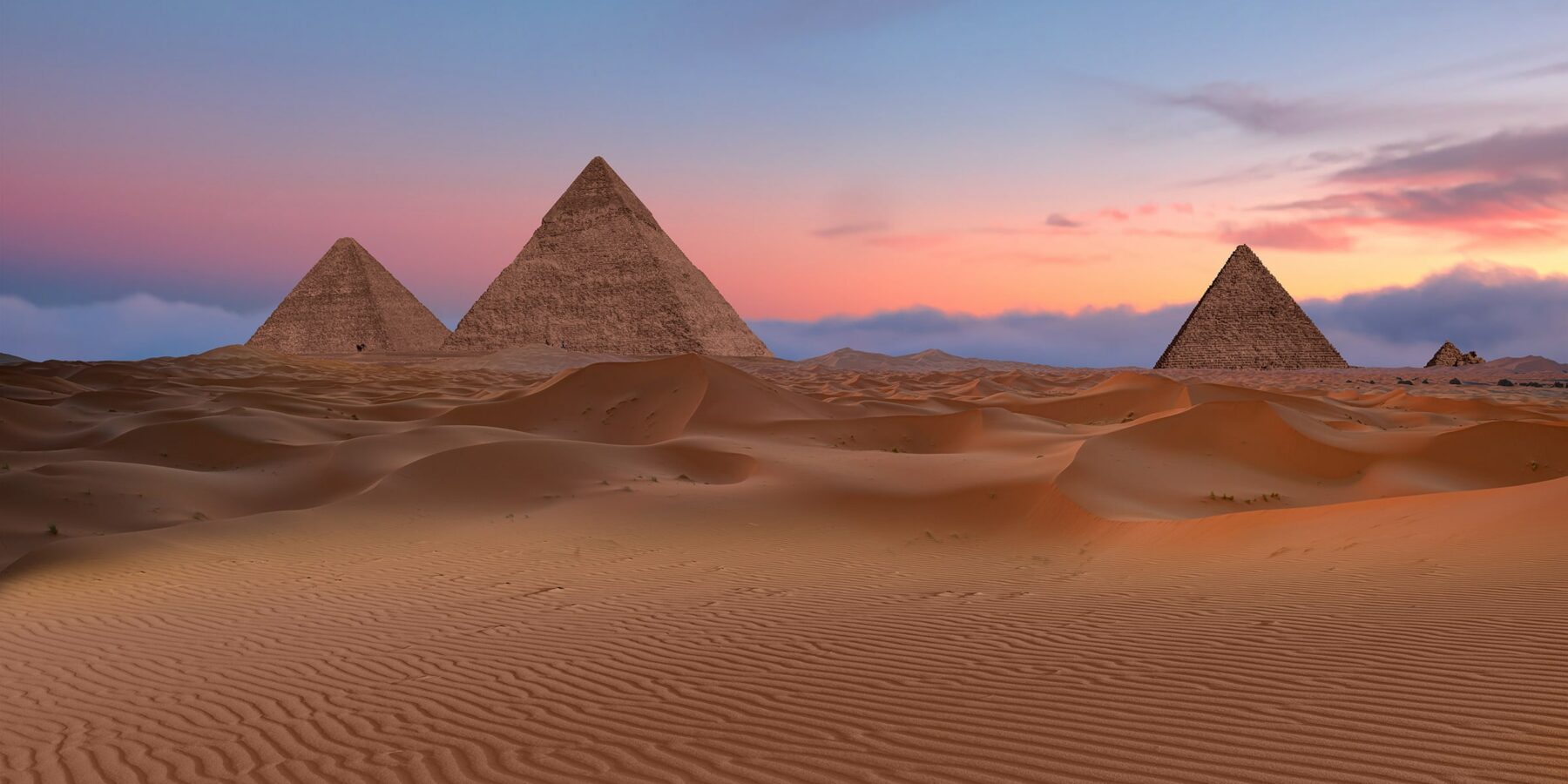 PYRAMIDS OF GIZA shutterstock_2426778901
