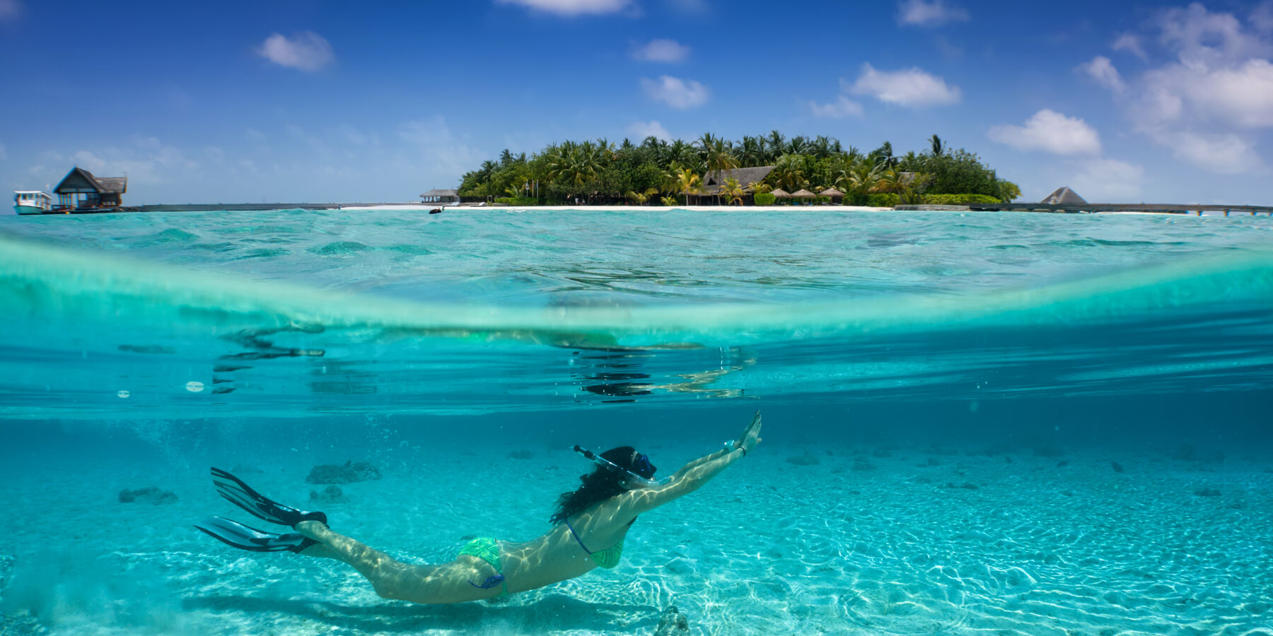 Woman,In,Bikini,Snorkeling,Under,Turquoise,,Tropical,Water,In,The
