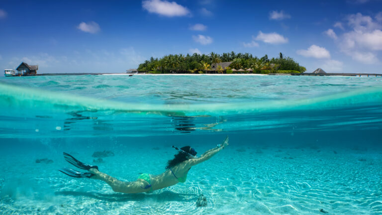 Woman,In,Bikini,Snorkeling,Under,Turquoise,,Tropical,Water,In,The