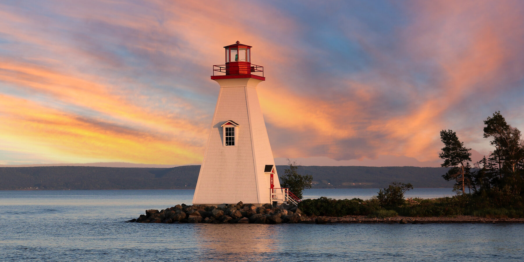 Cape,Breton,Lighthouse,In,A,Colorful,Sunset