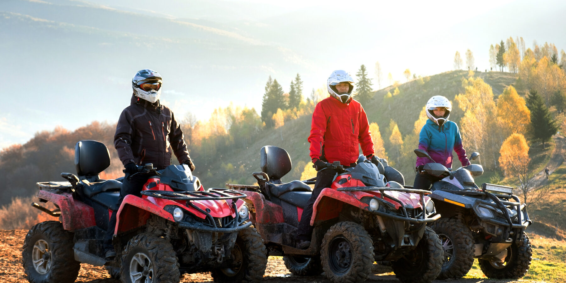 Happy,Drivers,In,Protective,Helmets,Enjoying,Extreme,Riding,On,Atv