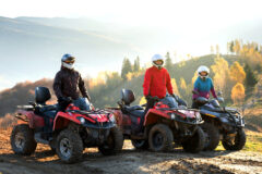 Happy,Drivers,In,Protective,Helmets,Enjoying,Extreme,Riding,On,Atv
