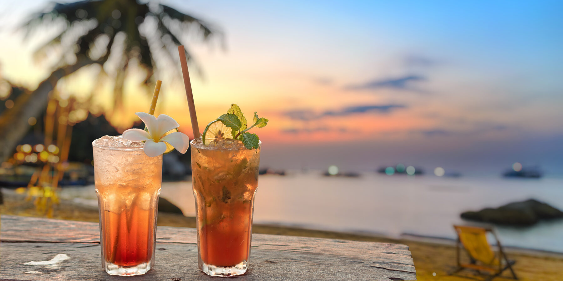 Drinks,With,Blur,Beach,And,Sunset,In,Background