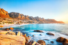 Cape,Town,Sunset,Over,Camps,Bay,Beach,With,Table,Mountain