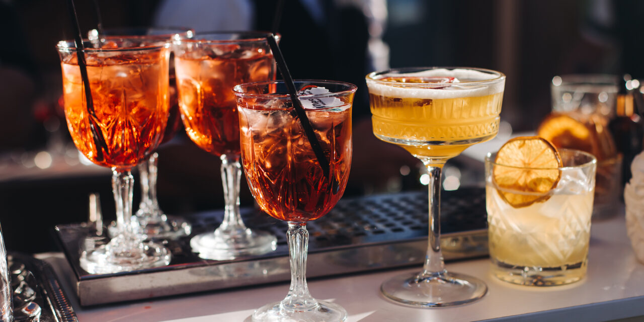 Bartender,Working,,Beautiful,Row,Line,Of,Different,Coloured,Liquor,Alcohol